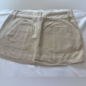 Beige Mini Skirt with Front Patch Pockets